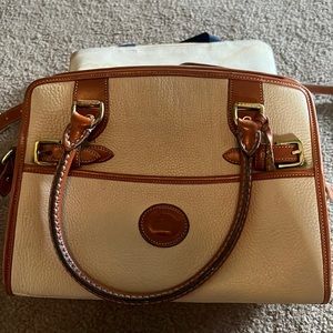 Dooney & Bourke like new bag.  Cream/saddle brown straps.  No marks/scratches!!